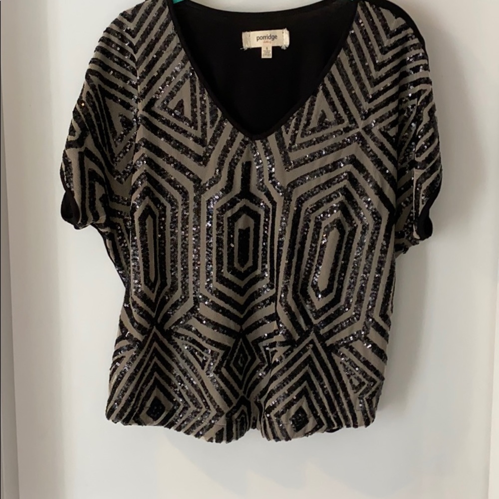 Fun, sparkly top with a gatsby vibe. Super cute with leather pants or skirt!
